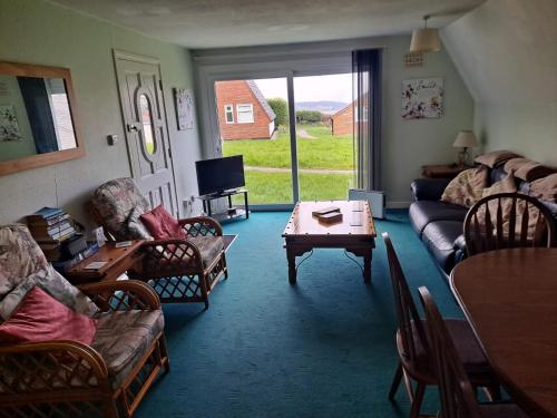 Χώρος καθιστικού στο Quiet Chalet near Bude, Cornwall