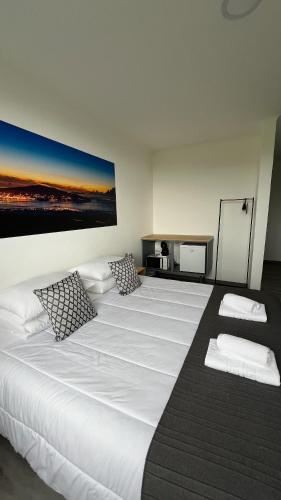 Ένα ή περισσότερα κρεβάτια σε δωμάτιο στο LN GuestHouse