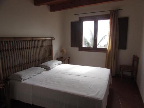 En eller flere senge i et værelse på Private Apartments 1 minute to the pool & beach Santa Maria #74B #86
