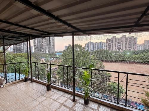 Μπαλκόνι ή βεράντα στο Garden View Terrace 1 BHK in Sanpada, Navi Mumbai