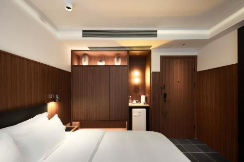 The Nest 1219 West Streetにあるベッド