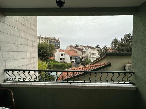 a balcony with a view of a city at Apartments Krapina Lux in Budva