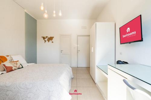 TV a/nebo společenská místnost v ubytování BARI ROOMS Suite Station