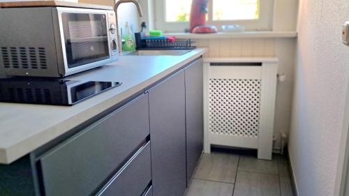 Η κουζίνα ή μικρή κουζίνα στο Apartment Brauner Hirsch