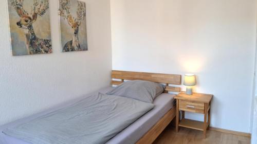 Ένα ή περισσότερα κρεβάτια σε δωμάτιο στο Apartment Brauner Hirsch