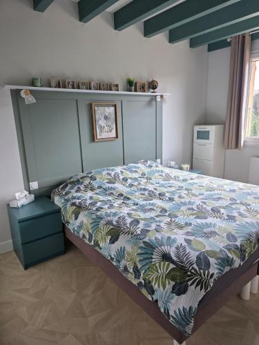 Katil atau katil-katil dalam bilik di Maison avec terrasse Davézieux