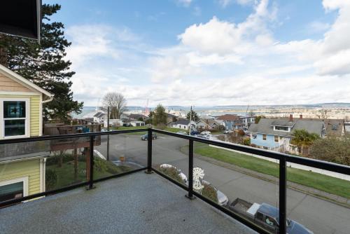 a balcony with a view of a street at Spacious 3BR Home Sleeps 8 Private Backyard in Everett