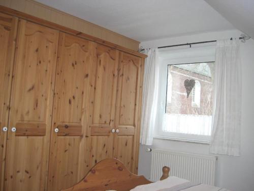 Postel nebo postele na pokoji v ubytování Ferienwohnung-West