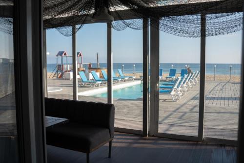 Bazén v ubytování Apart-Hotel Poseidon nebo v jeho okolí