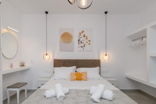 Ένα ή περισσότερα κρεβάτια σε δωμάτιο στο Sunny & Blue 2