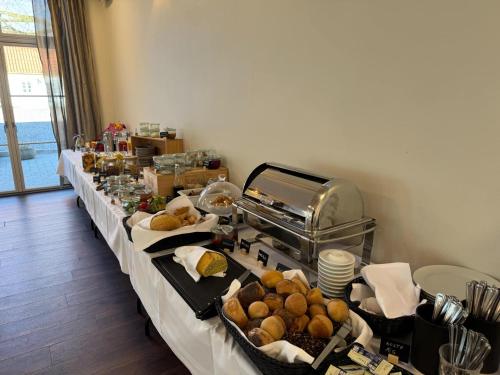 a buffet line with many different types of food at Bramslevgaard in Hobro