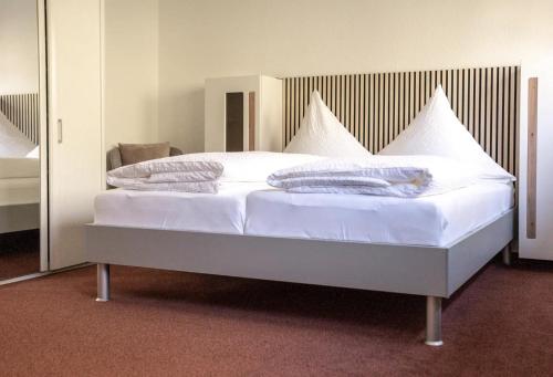 Postel nebo postele na pokoji v ubytování Pension Haus Monika