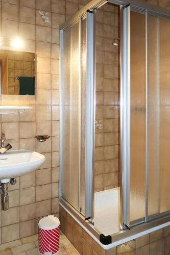 a bathroom with a shower and a sink at Apartment Garni Regina-2 by Interhome in Kappl