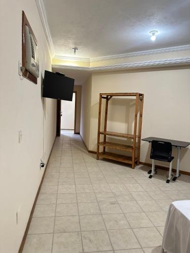 Μια τηλεόραση ή/και κέντρο ψυχαγωγίας στο Hotel Central Plaza Timóteo