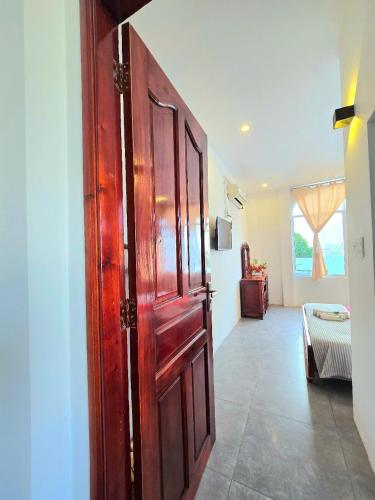Postel nebo postele na pokoji v ubytování Mekong 69 Hostel