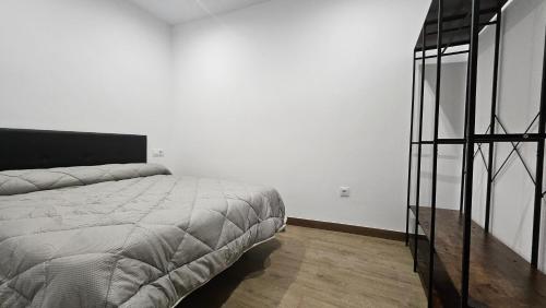 En eller flere senge i et værelse på Optimus Guadalquivir