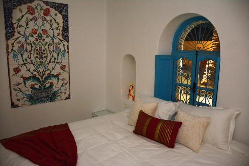Cama o camas de una habitación en Rêve à Djerba - Dar El Mina