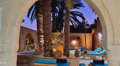 Zona de estar de Rêve à Djerba - Dar El Mina