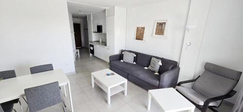 Posezení v ubytování Stunning one bedroom Pueblo Evita. Sea views