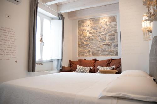 Postel nebo postele na pokoji v ubytování B&B Terra - Stanza Poesia