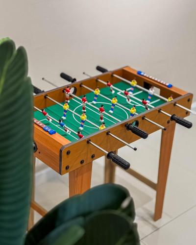 a foosball table with at Sunset Haven Taiping Homestay near Lake Garden TPG in Taiping