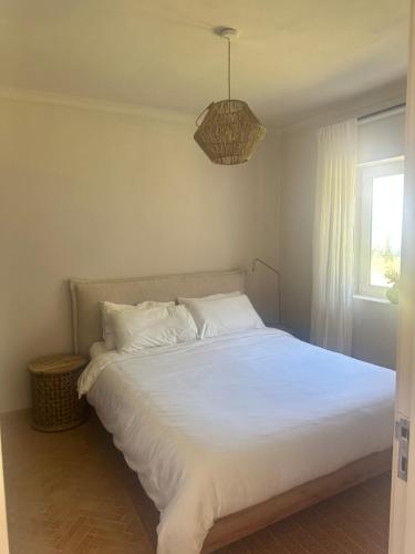 Postel nebo postele na pokoji v ubytování So Magoito Tiny house