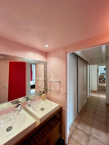 a bathroom with a sink and a mirror at Cassis Hostel in Cassis