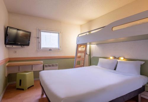 Postel nebo postele na pokoji v ubytování B&B HOTEL Annemasse Est