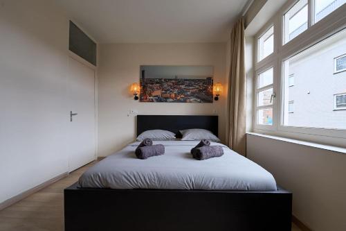 Postel nebo postele na pokoji v ubytování Cozy & Fully Equipped Studio in Eindhoven 1