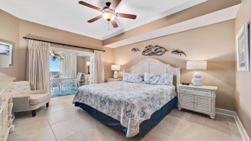 a bedroom with a bed and a ceiling fan at The Oasis at Orange Beach 1002 (Phoenix West II) in Orange Beach