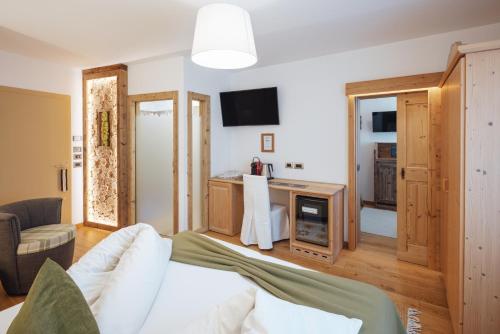TV a/nebo společenská místnost v ubytování Bio Boutique Hotel Laurino