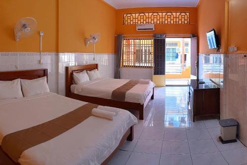Postel nebo postele na pokoji v ubytování Golden Home Guesthouse