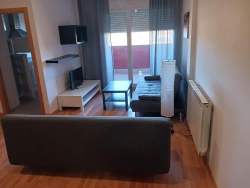 Μια τηλεόραση ή/και κέντρο ψυχαγωγίας στο APARTAMENTOS ANDORRA Teruel