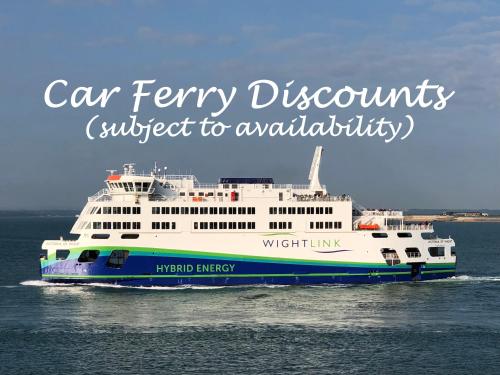 a ferry boat in the water with the words car ferry discounts subject to availability at 2 Bedroom Chalet SB113, Sandown Bay, Isle of Wight in Brading