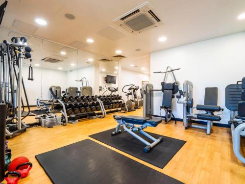 a gym with treadmills and cardio machines at Chessington Resort Hotel in Chessington