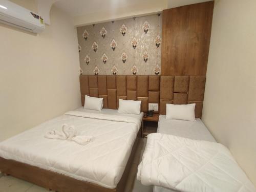 Letto o letti in una camera di The prime hotel