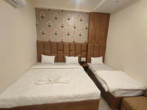 Letto o letti in una camera di The prime hotel