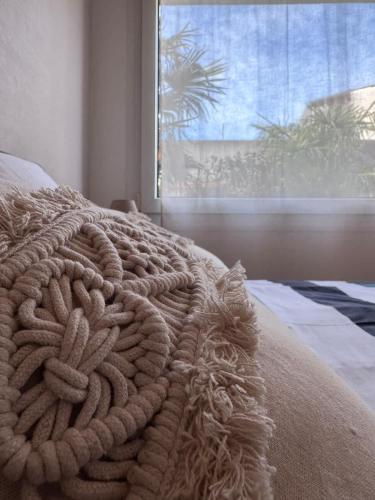 Cama o camas de una habitación en Appart-Hotel des coquillages Résidence Kiwi