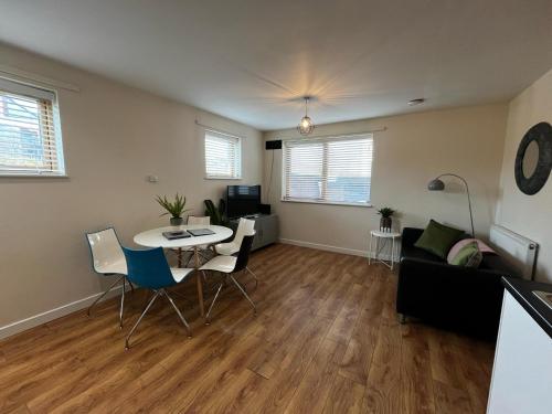 Χώρος καθιστικού στο Three Bedroom Townhouse with Parking