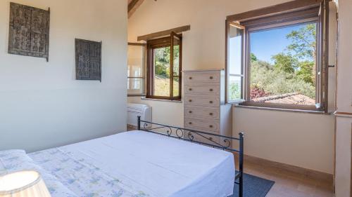 Кровать или кровати в номере DALMANUTA 8, Emma Villas
