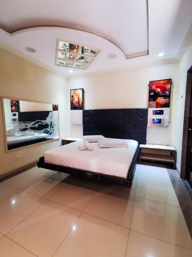 Postel nebo postele na pokoji v ubytování SP Hotel & Motel