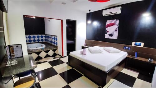 Postel nebo postele na pokoji v ubytování SP Hotel & Motel