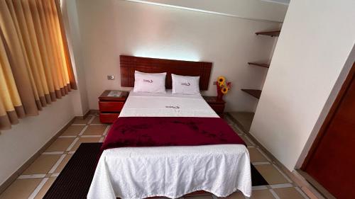 Postel nebo postele na pokoji v ubytování Hotel Los Arcos de Imperial
