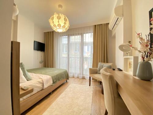 Postel nebo postele na pokoji v ubytování Şişli Of Apartment No 12