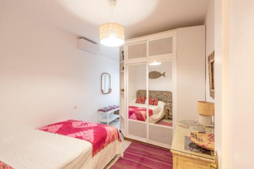 Postel nebo postele na pokoji v ubytování Casa Dehesa, Vejer de la Frontera