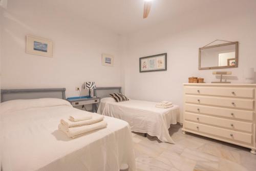 Postel nebo postele na pokoji v ubytování Casa Dehesa, Vejer de la Frontera