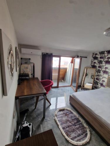 Luxurious Flat tesisinde bir odada yatak veya yataklar