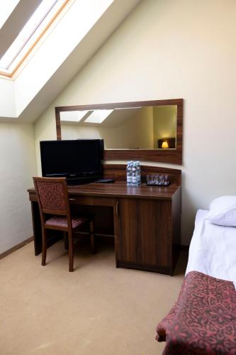 Katil atau katil-katil dalam bilik di Hotel Chrobry