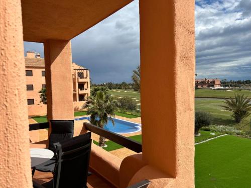 a view from the balcony of a resort with a pool at Casa Matthis in Los Alcázares