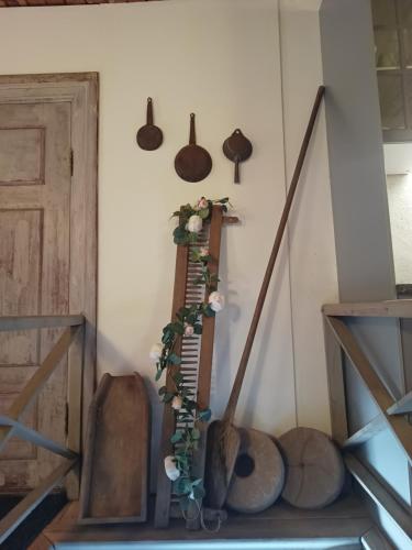 a room with a staircase with a musical instrument at Kungsgården BnB in Kungsgården
